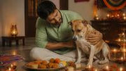 Indian pet parent comforting dog near scattered Diwali sweets in warm diya light